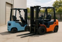 Two forklifts side by side one diesel and one electric