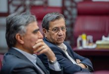 همتی و فرزین در ساختمان شیشه‌ای رو در رو شدند